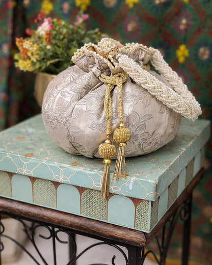Luxury Handcrafted Silk Potli Bag with Pearl Tassels