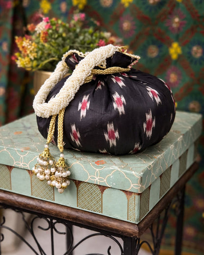 Luxury Handcrafted Silk Potli Bag with Pearl Tassels