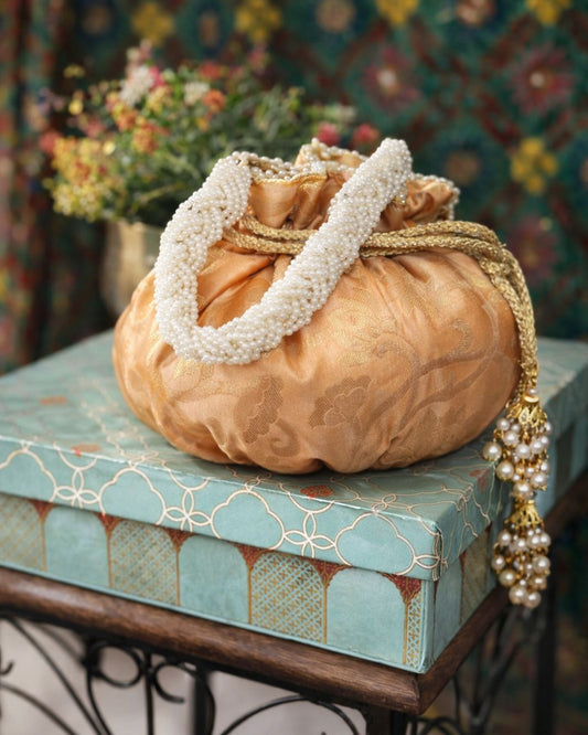 Luxury Handcrafted Silk Potli Bag with Pearl Tassels