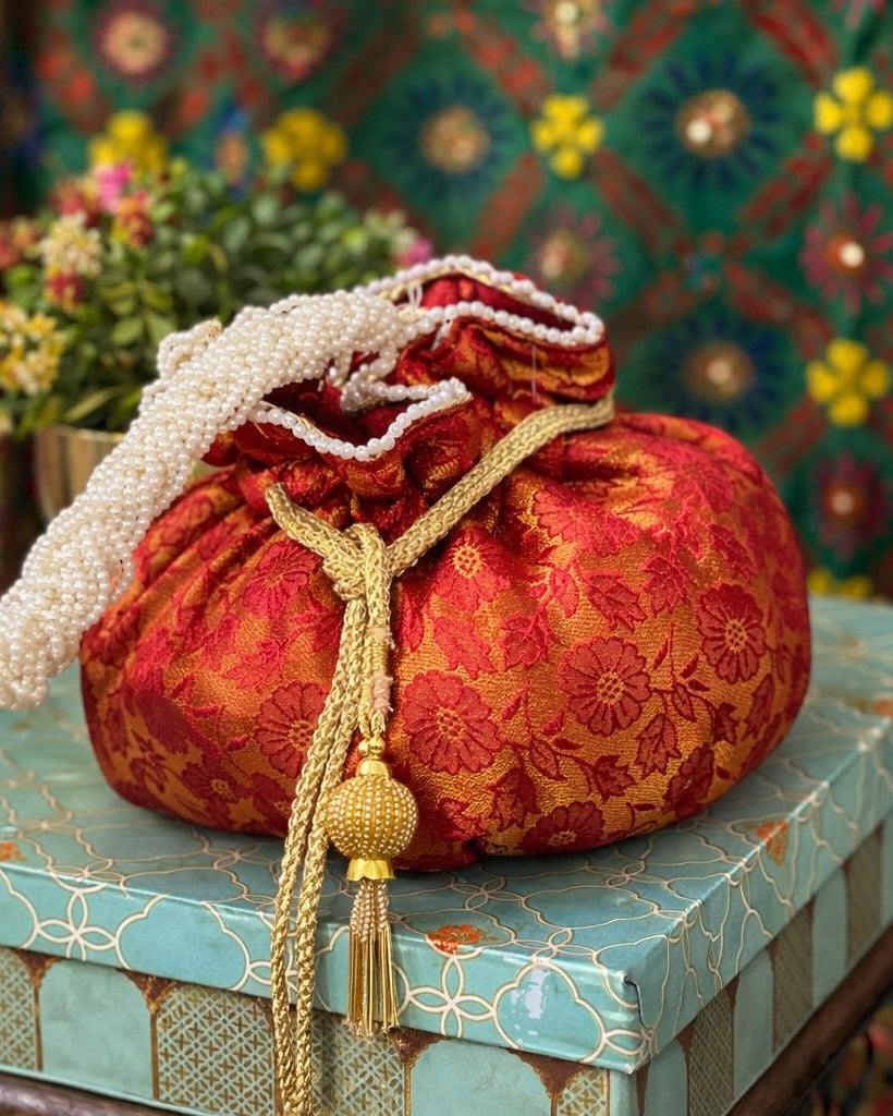 Luxury Handcrafted Silk Potli Bag with Pearl Tassels
