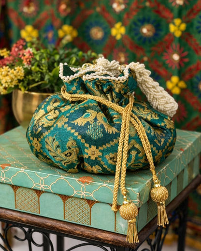 Luxury Handcrafted Silk Potli Bag with Pearl Tassels
