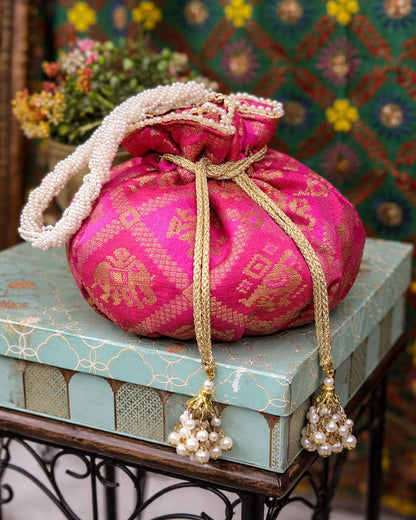 Luxury Handcrafted Silk Potli Bag with Pearl Tassels