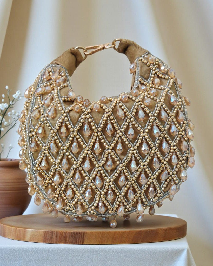 Luxury Hand-Embellished Crystal Potli Bag with Pearl & Bead Work – Designer Ethnic Clutch for Weddings & Festive Occasions