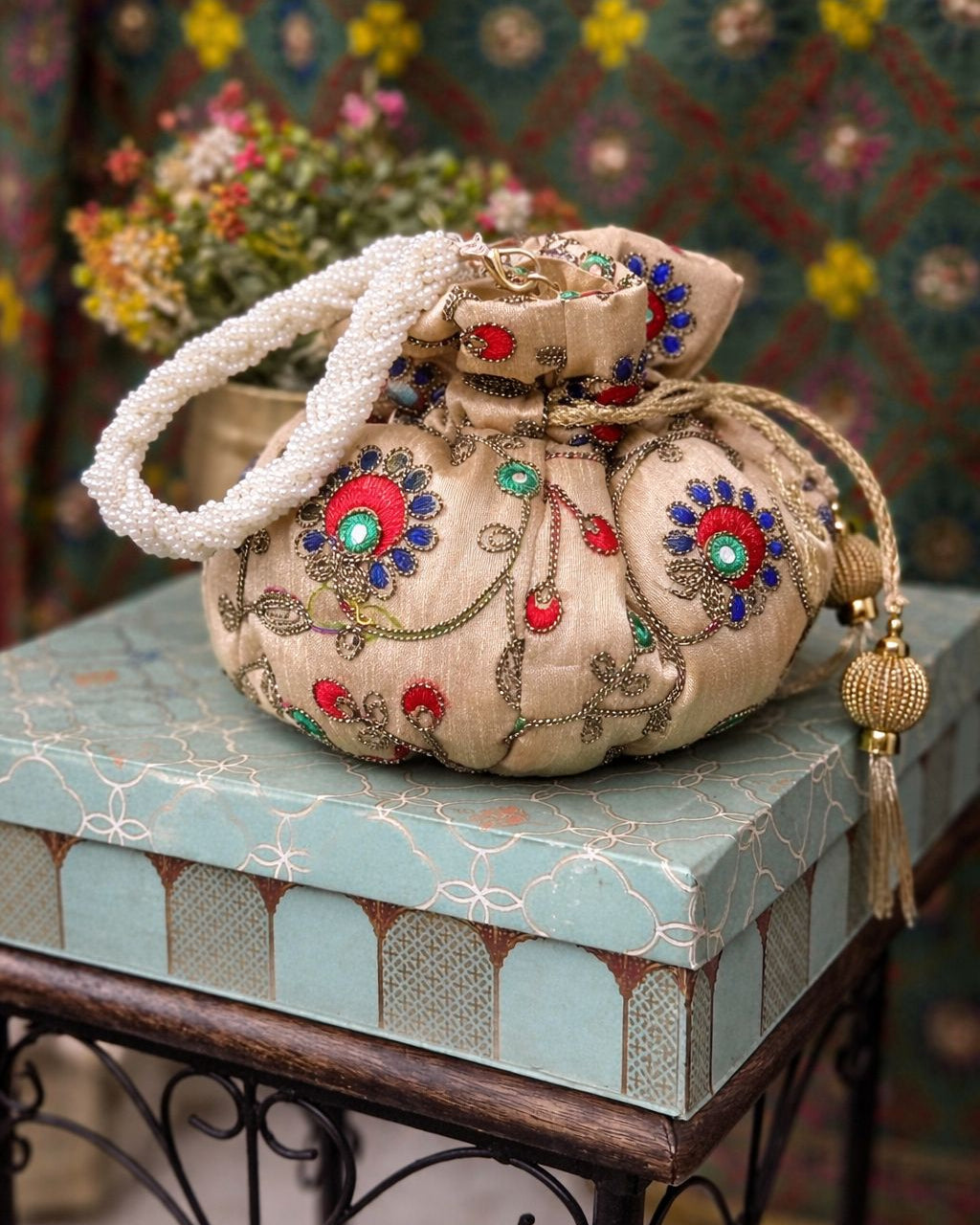 Luxury Handcrafted Silk Potli Bag with Pearl Tassels