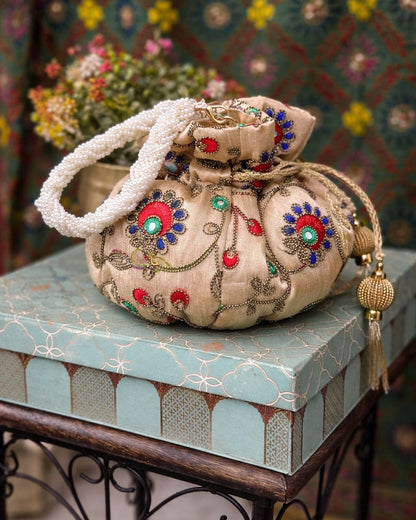 Luxury Handcrafted Silk Potli Bag with Pearl Tassels