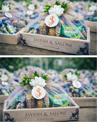 Personalized Wedding Welcome Hampers in Custom Wooden Trays with Elegant Floral Net Wrapping
